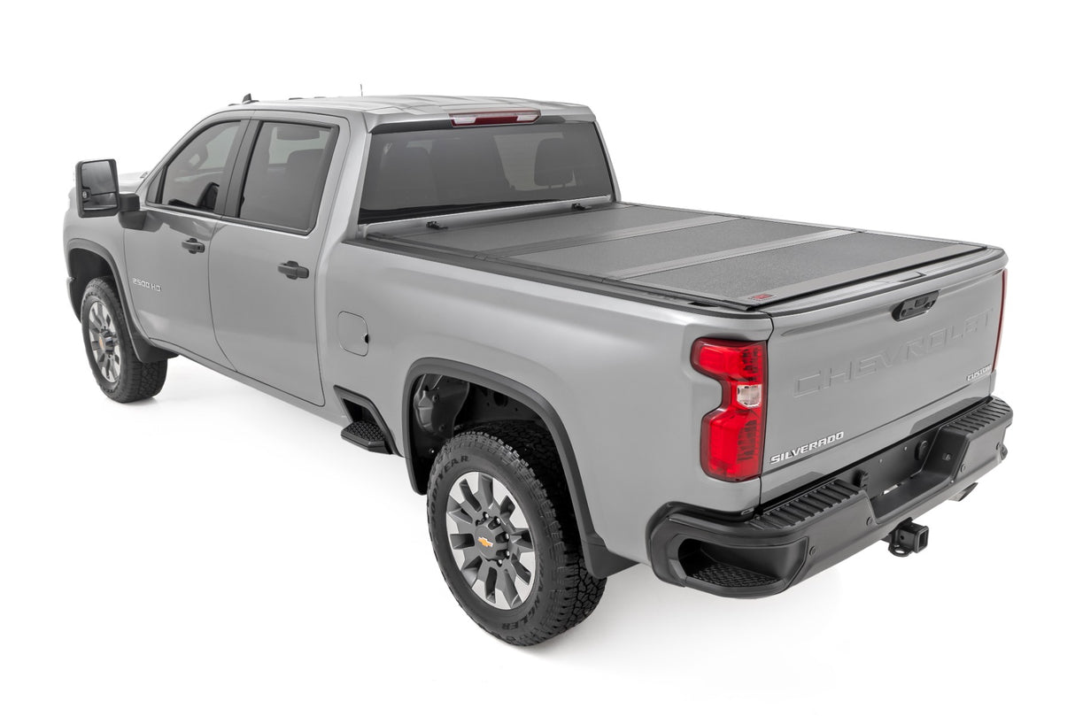 Hard Tri-Fold Flip Up Bed Cover | 6'9" Bed | Chevy/GMC Silverado/Sierra 2500HD/3500HD (20-24)