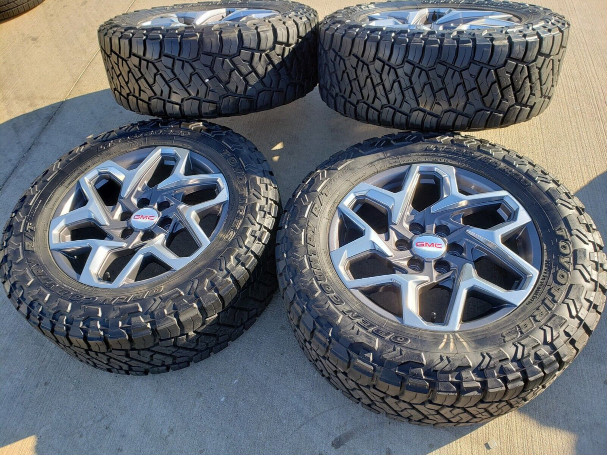 20" GMC Sierra Yukon AT4 Tahoe Silverado OEM 95369 wheels rims TOYO 34" Texas Truck Tire