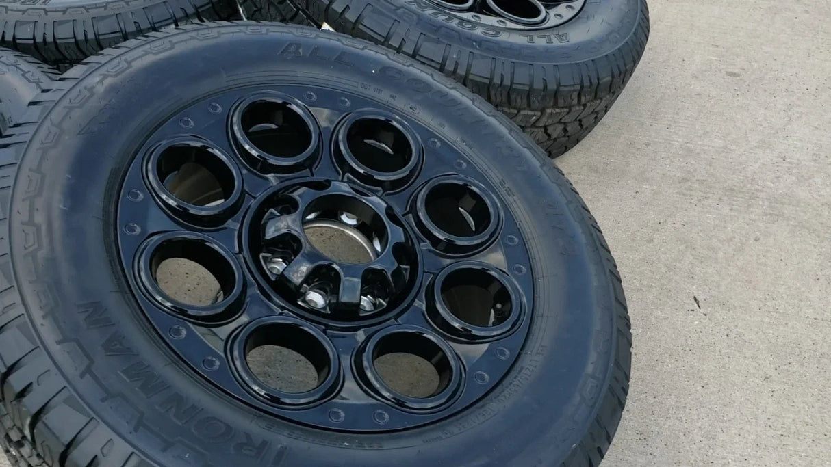 20" Ford F-250 F-350 OEM black TREMOR wheels rims 10299 10484 A/T2 tires NEW Texas Truck Tire