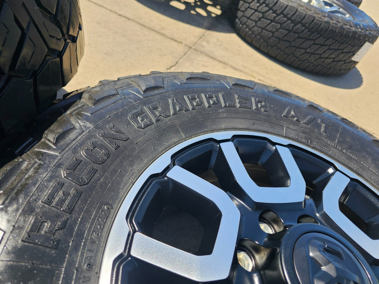 18" Ram 2500 3500 LARAMIE OEM wheels rims 2694 tires 35" NITRO Texas Truck Tire