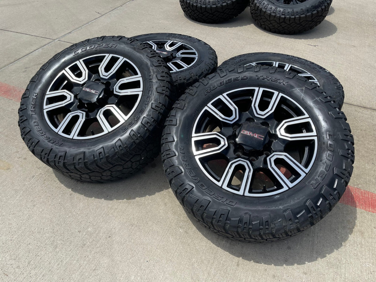 20" GMC Sierra AT4 2500 3500 OEM wheels rims 5950 Silverado COOPER RUGGED TREK Texas Truck Tire