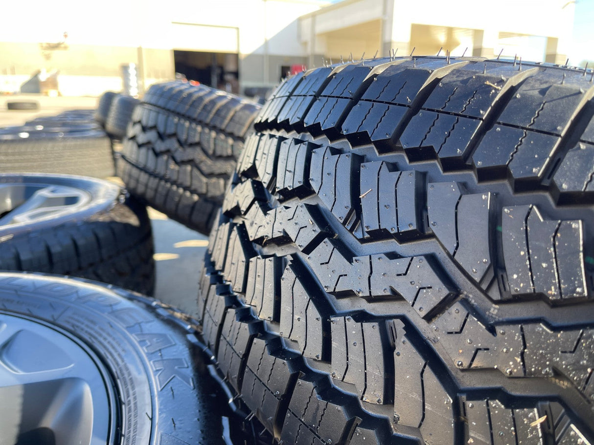 20" Dodge Ram 1500 OEM Laramie Black 2680 wheels rims 2025 2026 FALKEN A/T3 NEW Texas Truck Tire