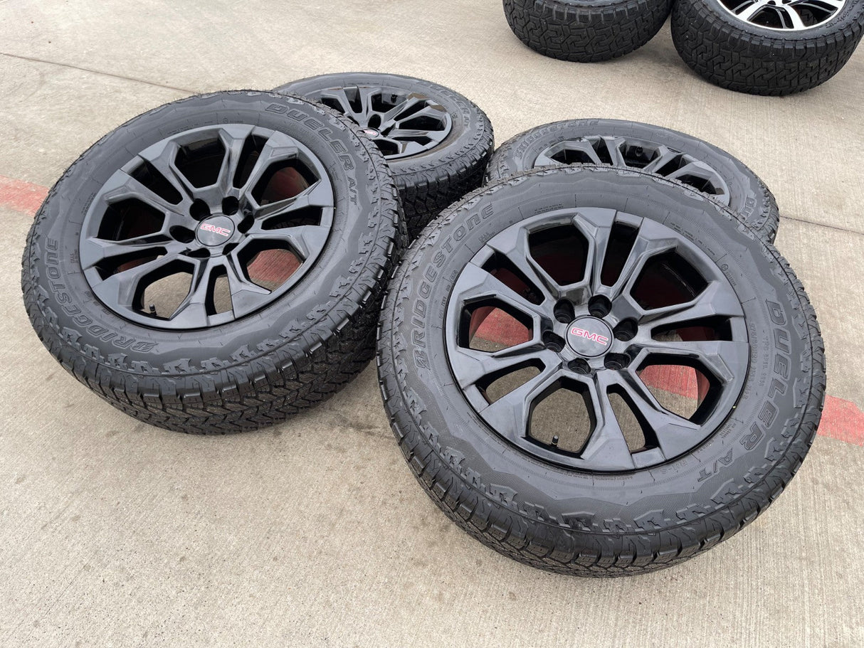 20" Chevy Tahoe Silverado OEM 14090 95417 wheels rims tires BRIDGESTONE A/T NEW Texas Truck Tire