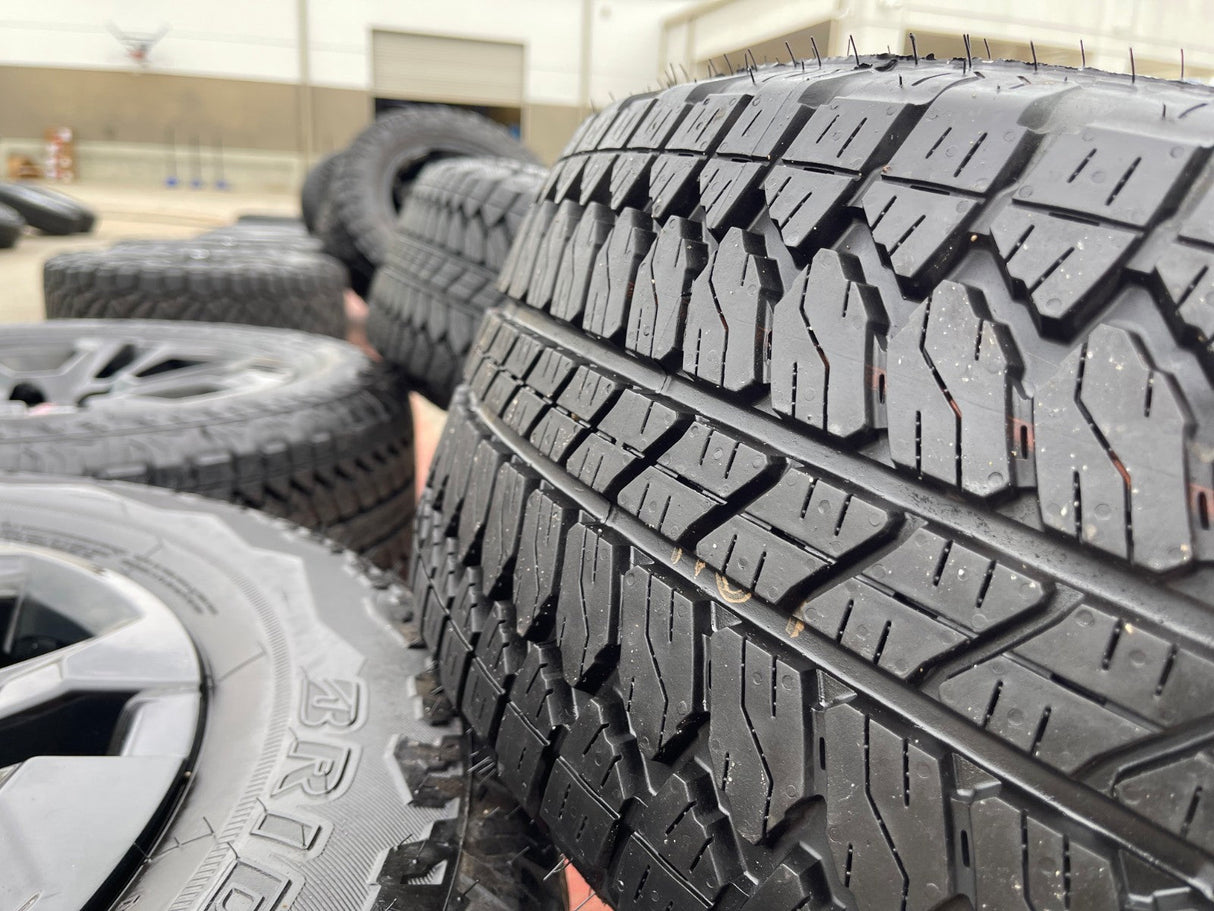 20" Chevy Tahoe Silverado OEM 14090 95417 wheels rims tires BRIDGESTONE A/T NEW Texas Truck Tire