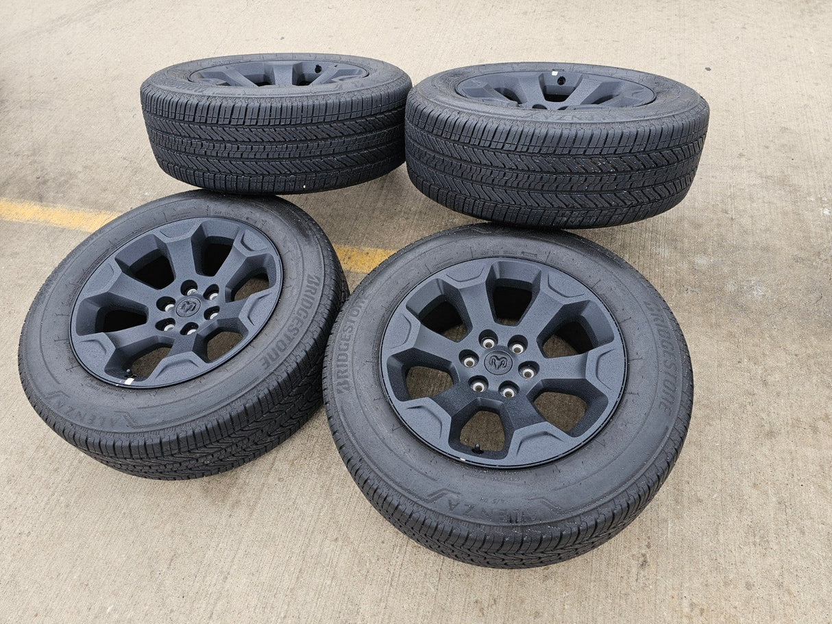 20" Dodge Ram 1500 OEM Laramie Black 2680 wheels rims 2024 2025 2026 BRIDGESTONE Texas Truck Tire
