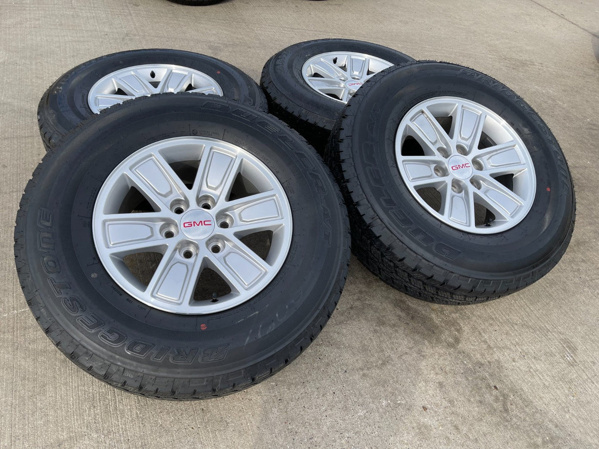 17" GMC Sierra Yukon Chevy Silverado Tahoe OEM 5654 wheels rims BRIDGESTONE A/T Texas Truck Tire