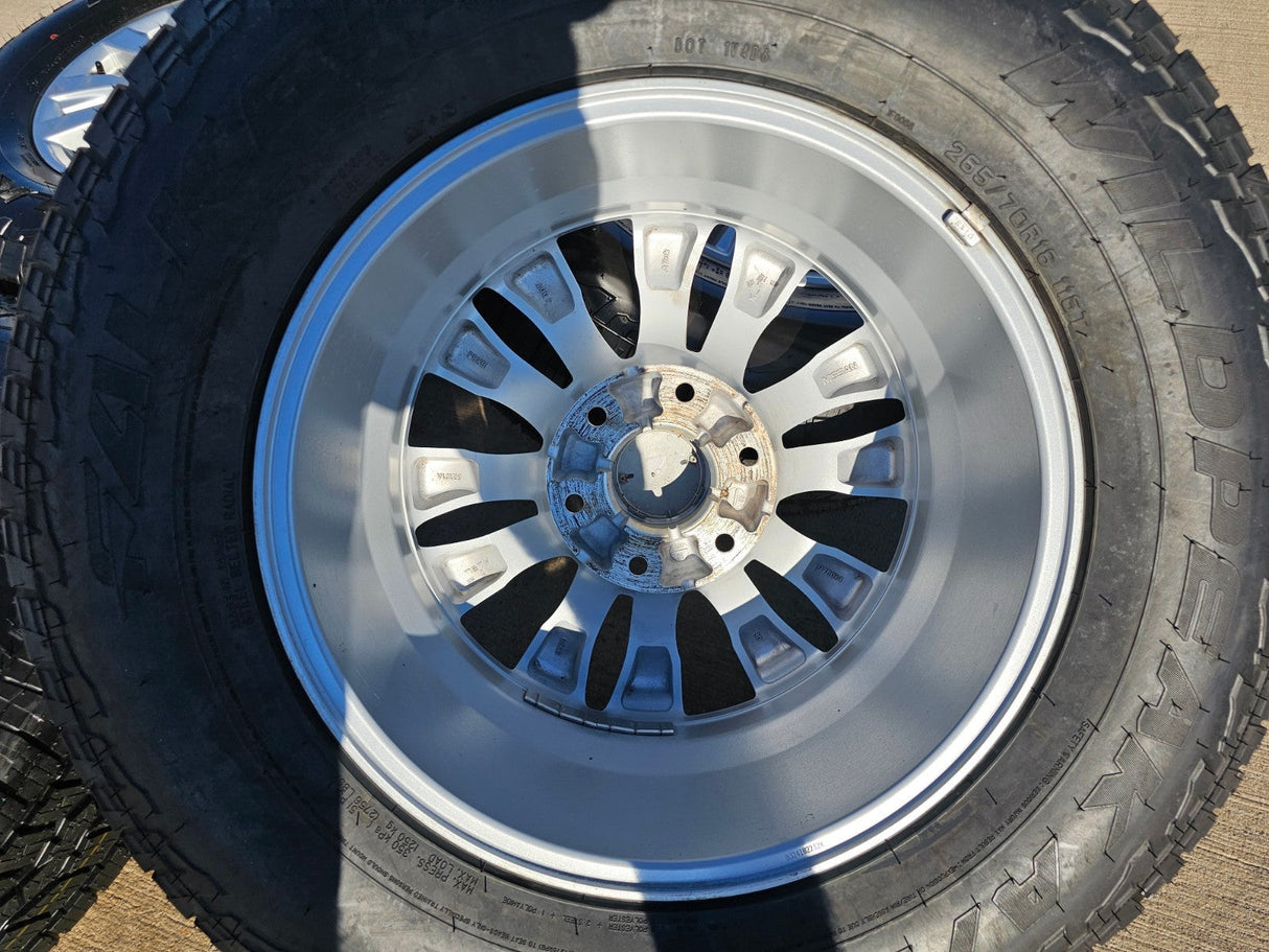 18" Nissan Titan Armada PRO-4X OEM 62737 wheels rims FALKEN A/T3 tires NEW Texas Truck Tire