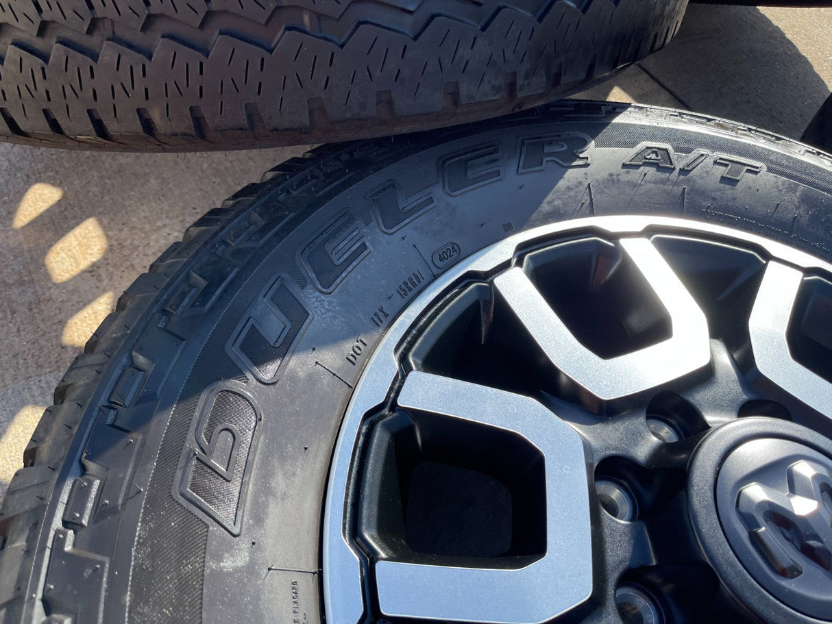 18" Ram 2500 3500 LARAMIE OEM wheels rims 2694 tires BRIDGESTONE A/T Texas Truck Tire