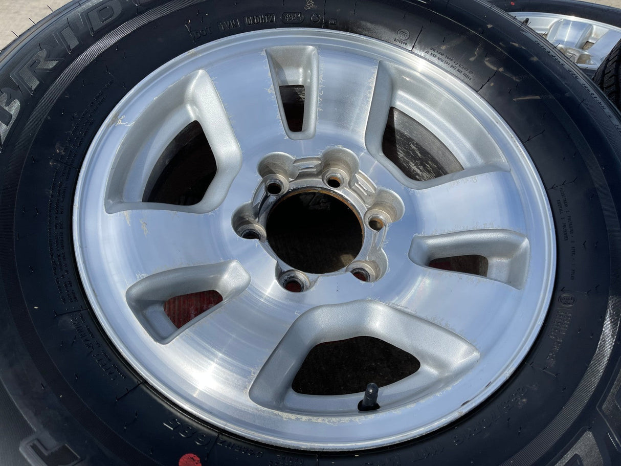 16" Toyota Tacoma wheels rims tires 69356 OEM 4Runner FJ Cruiser BRIDGESTONE Texas Truck Tire
