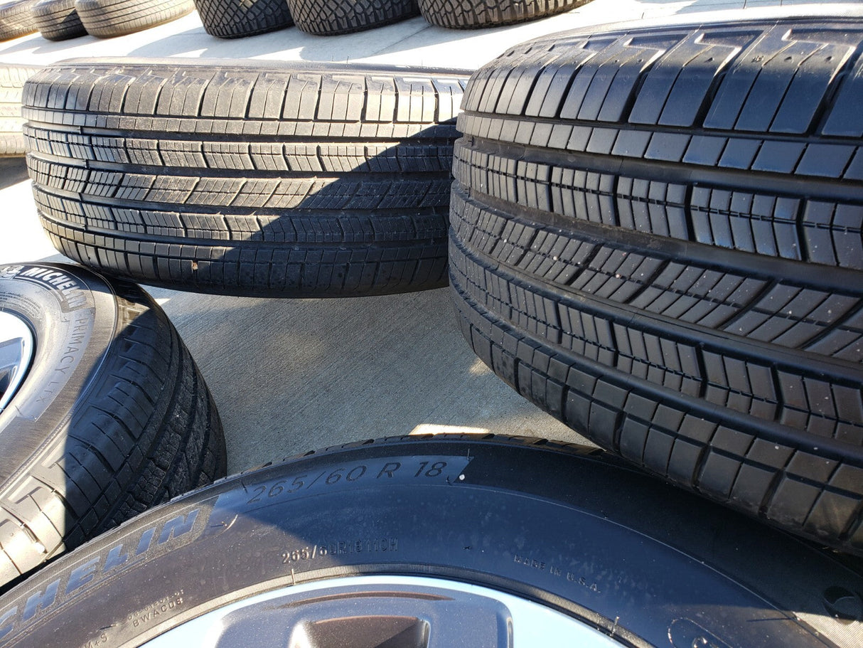 18" Jeep Grand Cherokee L OEM wheels rims 9308 Durango tires MICHELIN Texas Truck Tire