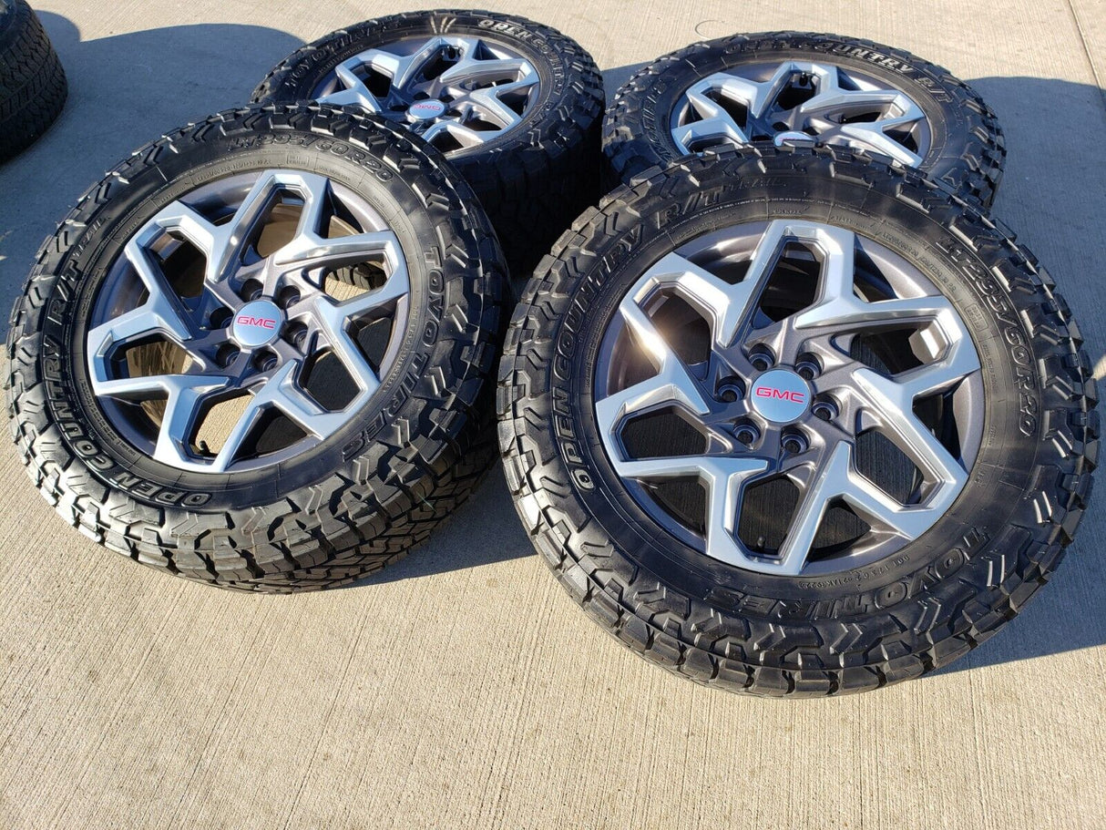 20" GMC Sierra Yukon AT4 Tahoe Silverado OEM 95369 wheels rims TOYO 34" Texas Truck Tire