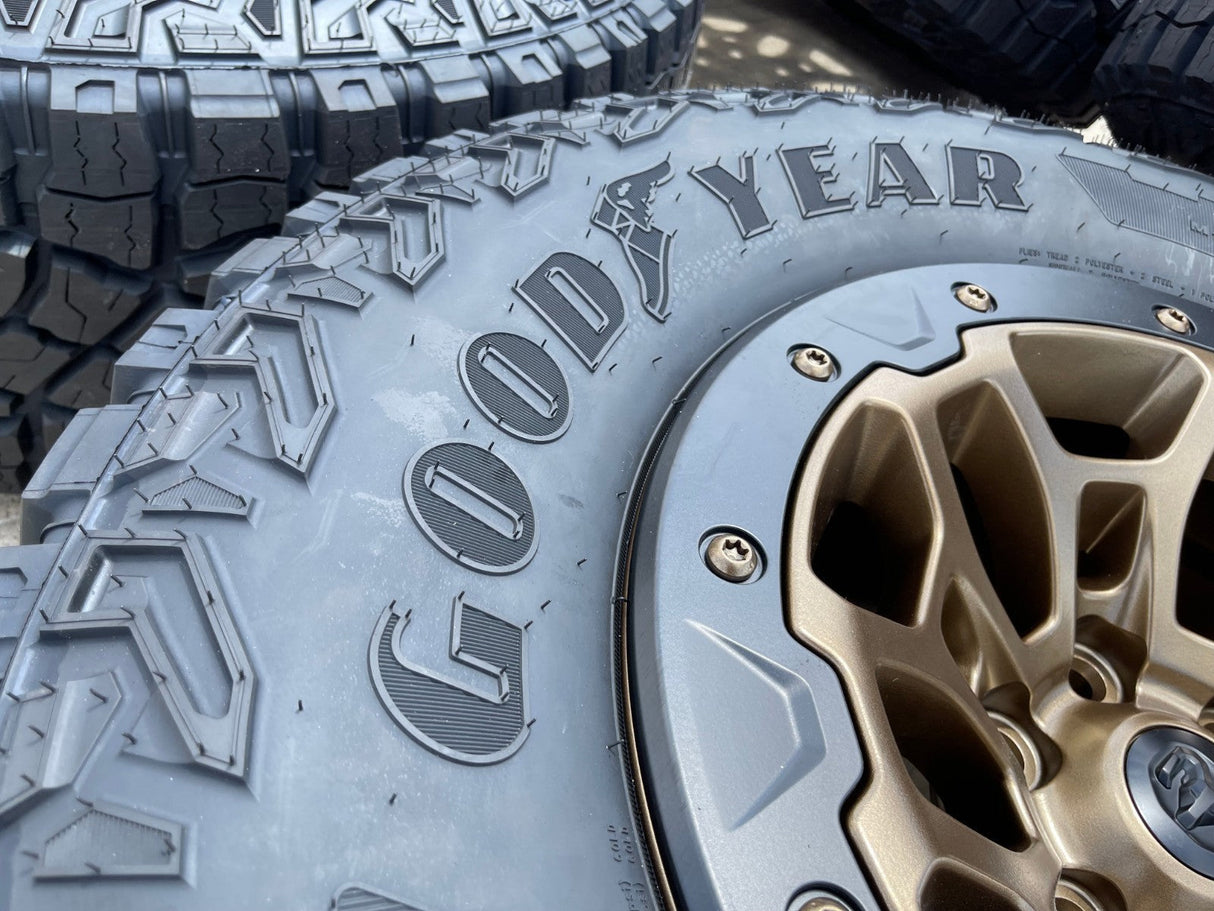 18" Dodge Ram 1500 TRX Beadlock OEM bronze RHO wheels rims 2735 tires 35" NEW Texas Truck Tire