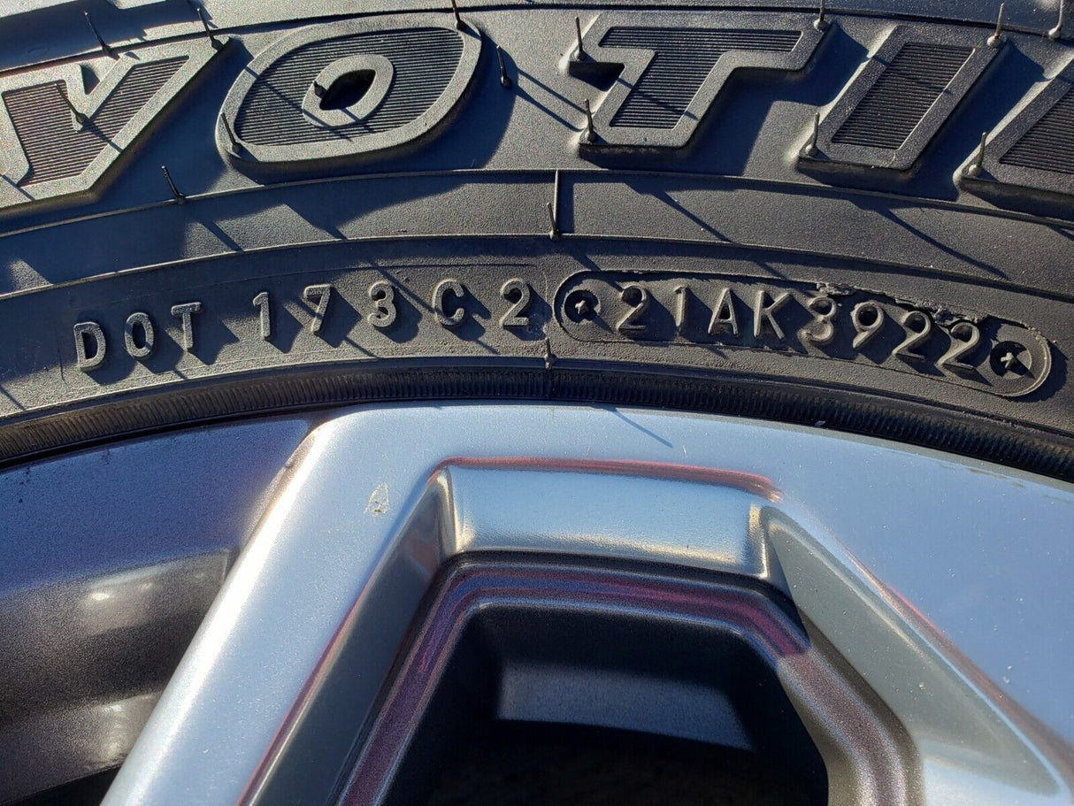 20" GMC Sierra Yukon AT4 Tahoe Silverado OEM 95369 wheels rims TOYO 34" Texas Truck Tire