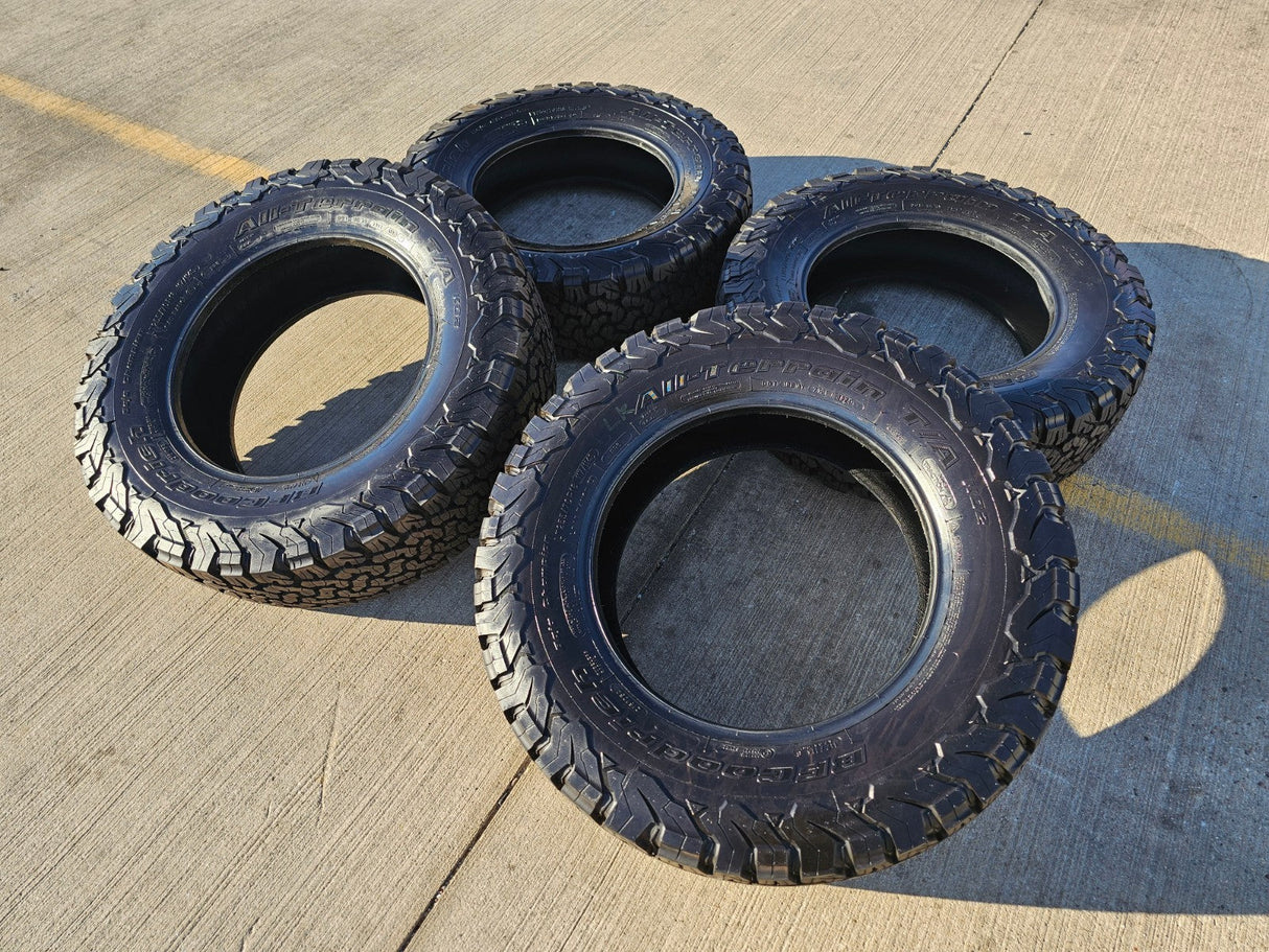 (4) 255/70/18 BFG KO2 A/T tires F-150 Sierra Tahoe Silverado NEW TAKE OFFS NEW Texas Truck Tire