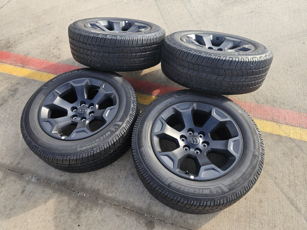 20" Dodge Ram 1500 OEM Laramie Black 2680 wheels rims 2024 2025 2026 MICHELIN Texas Truck Tire