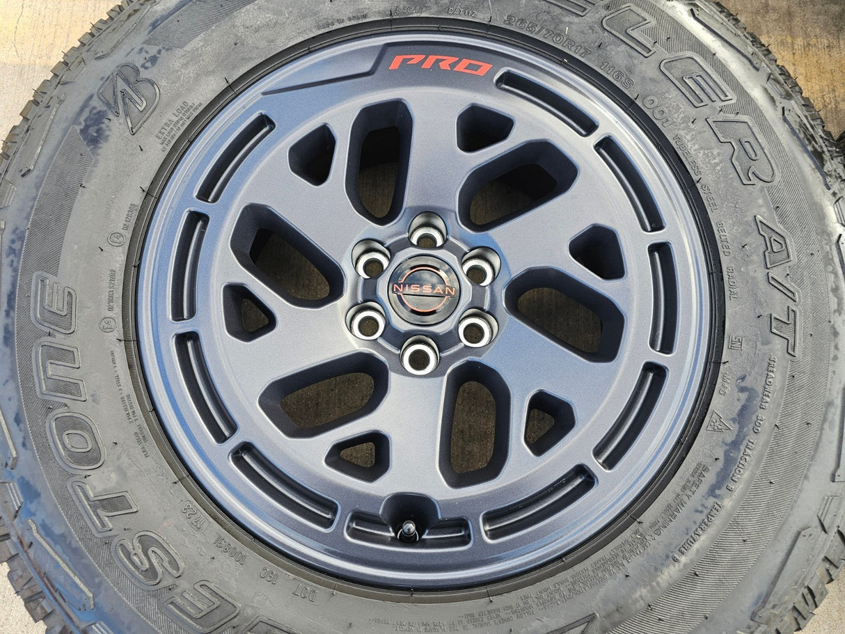 17" Nissan Frontier X-PRO OEM Desert Runner wheels rims tires DUELER A/T Texas Truck Tire