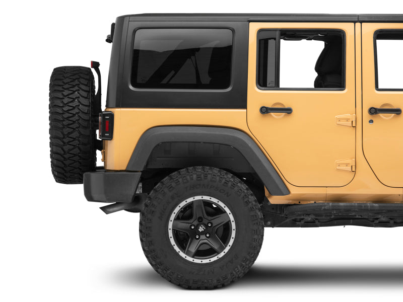 Feux arrière à LED Raxiom 07-18 Jeep Wrangler JK Axial Series - Boîtier noir (lentille fumée foncée)
