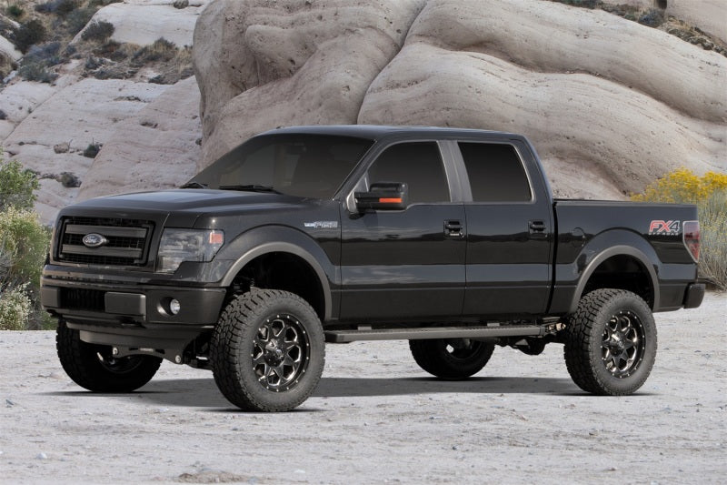 Système de base Fabtech 2014 Ford F150 4WD 6 pouces avec amortisseurs de performance