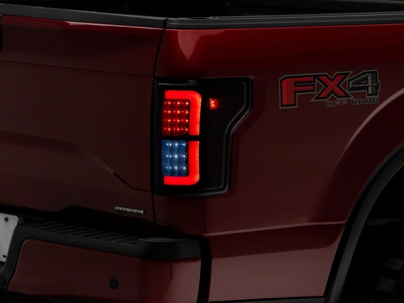 Feux arrière à LED Raxiom 15-17 Ford F-150 Axial Series - Boîtier noir (lentille fumée)