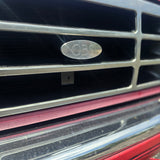 Diesels and Dirtbags Billet Grille Emblem – 1992–1997 Ford F-Series Diesels and Dirtbags