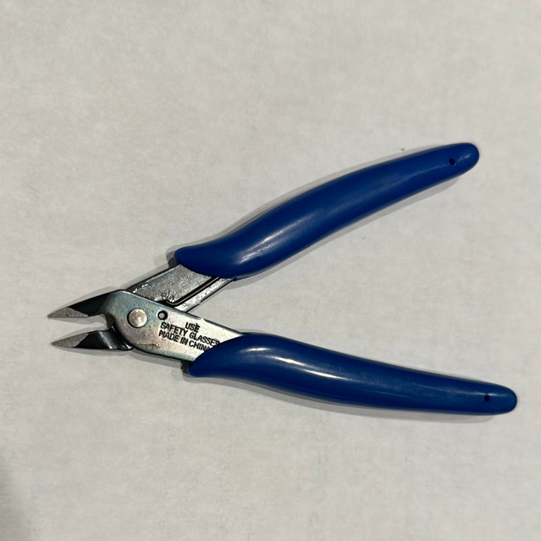 Outil de coupe à ras 