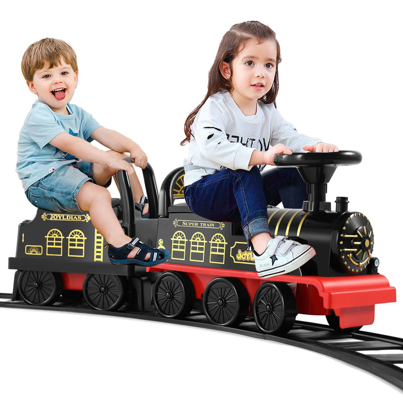 Interactive 6V Electric Kids Train Set with Track, Carriage, Lights, Whistle, Music, Storytelling, and Storage