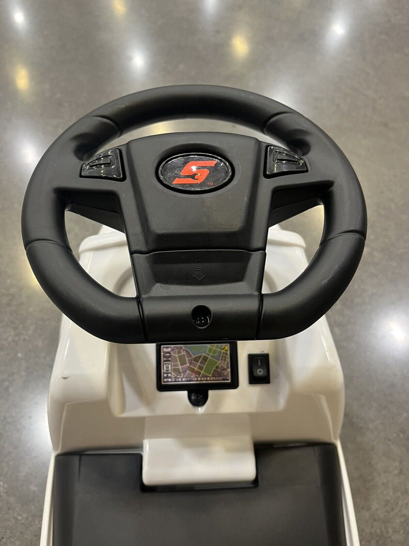 Rev Up Your Child's Playtime with the Snap On Tools White Truck Ride-On Toy - Complete with Sound Effects!