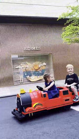 Kids Ride-On Train for Backyard Fun – Battery Powered W/Magic Cars® Remote Control, Real Steam Stack, MP3 & Working Caboose (Ages 1–10)