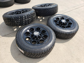 20" Ford F-250 F-350 OEM black TREMOR wheels rims 10299 10484 A/T2 tires NEW Texas Truck Tire