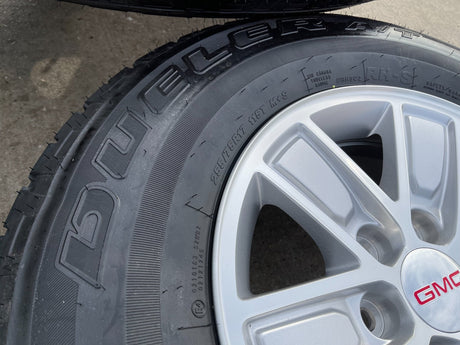 17" GMC Sierra Yukon Chevy Silverado Tahoe OEM 5654 wheels rims BRIDGESTONE A/T Texas Truck Tire