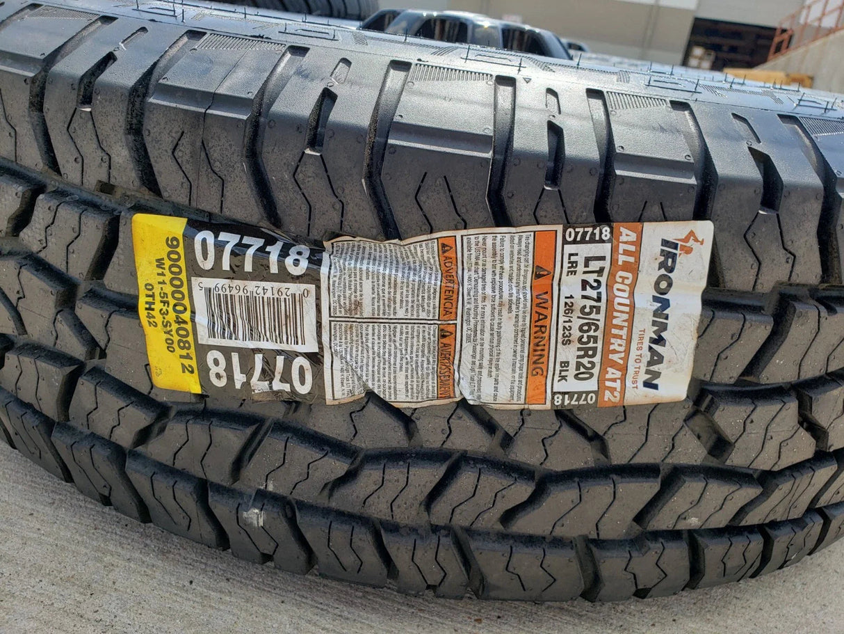20" Ford F-250 F-350 OEM black TREMOR wheels rims 10299 10484 A/T2 tires NEW Texas Truck Tire