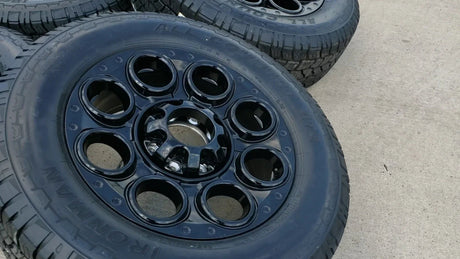 20" Ford F-250 F-350 OEM black TREMOR wheels rims 10299 10484 A/T2 tires NEW Texas Truck Tire
