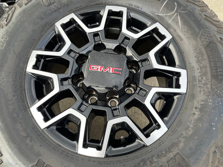 18" GMC Sierra AT4X Chevy Trail Boss 2500 OEM 14136 wheels rims GOODYEAR 35" Texas Truck Tire