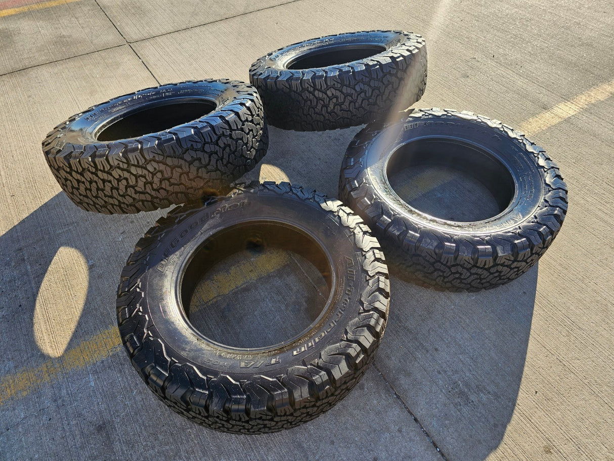 (4) 255/70/18 BFG KO2 A/T tires F-150 Sierra Tahoe Silverado NEW TAKE OFFS NEW Texas Truck Tire