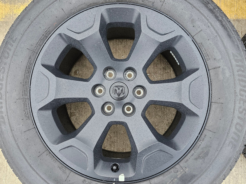 20" Dodge Ram 1500 OEM Laramie Black 2680 wheels rims 2024 2025 2026 BRIDGESTONE Texas Truck Tire