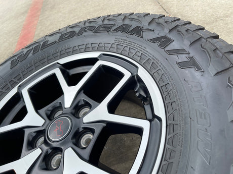 17" Jeep Wrangler Rubicon OEM 95730 9327 wheels rims Gladiator FALKEN A/T 33" Texas Truck Tire