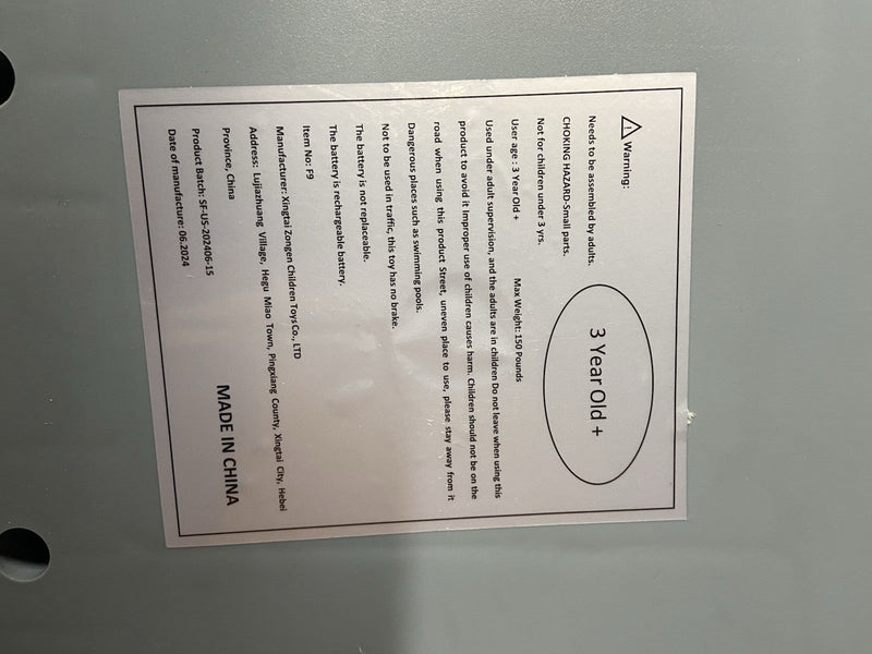 Battery-Powered Ride-On Toy Car with Steering Handle and Storage Compartment