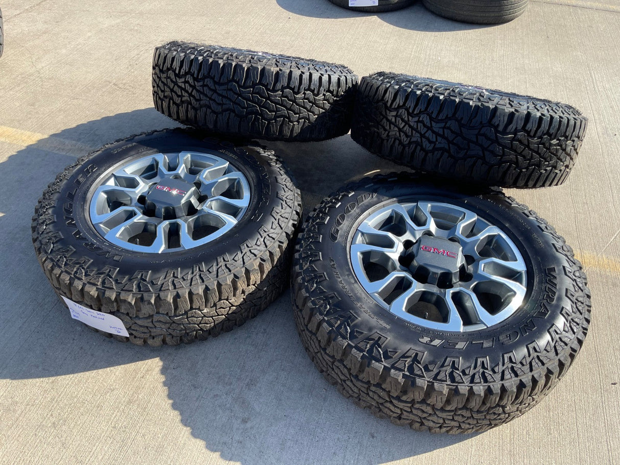 18" GMC Sierra AT4X Chevy Silverado 2500 3500 OEM 5949 wheels rims GOODYEAR A/T Texas Truck Tire