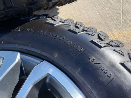 18" GMC Sierra AT4X Chevy Silverado 2500 3500 OEM 5949 wheels rims GOODYEAR A/T Texas Truck Tire