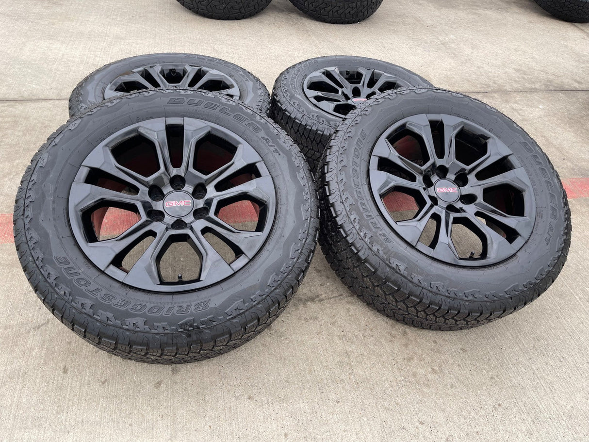 20" Chevy Tahoe Silverado OEM 14090 95417 wheels rims tires BRIDGESTONE A/T NEW Texas Truck Tire