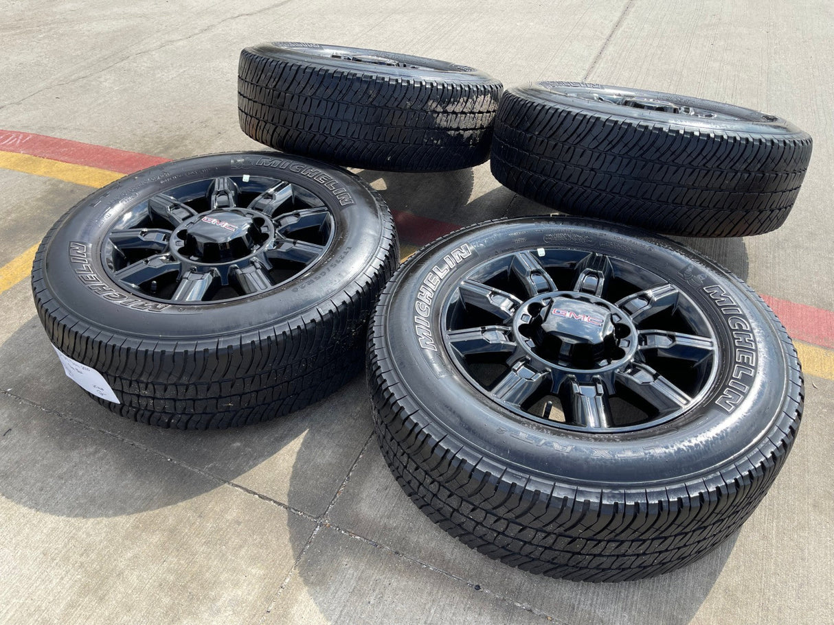 20" GMC Sierra AT4X 2500 3500 OEM 14137 5963 wheels rims Silverado MICHELIN Texas Truck Tire