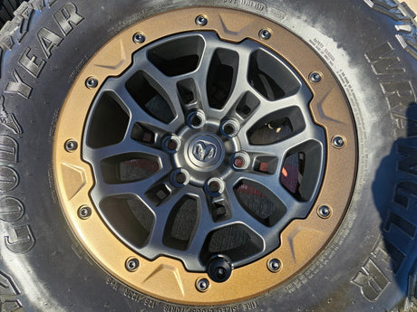 18" Dodge Ram 1500 TRX Beadlock OEM bronze RHO wheels rims 2735 tires NEW 35" Texas Truck Tire