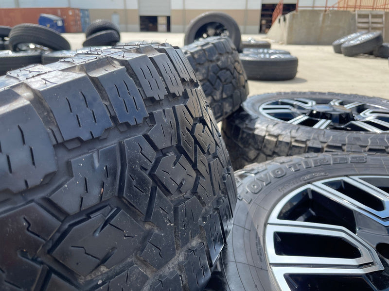 20" GMC Sierra AT4 2500 3500 OEM wheels rims 5950 Silverado tires TOYO A/T3 Texas Truck Tire