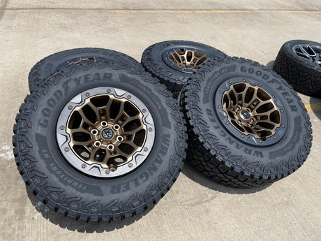 18" Dodge Ram 1500 TRX Beadlock OEM bronze RHO wheels rims 2735 tires 35" NEW Texas Truck Tire