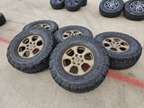 17" Ford Bronco 10384 OEM wheels rims BRONZE tires Ranger 35" M/T Texas Truck Tire