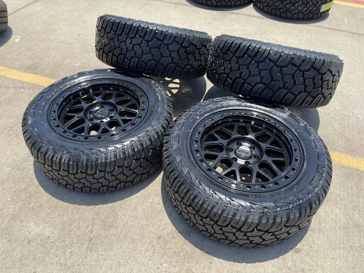 20x9 20" KMC KM549 Ford Expedition F-150 6x135 wheels rims tires 33" NEW Texas Truck Tire