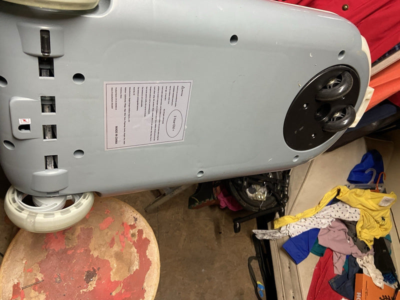 Battery-Powered Ride-On Toy Car with Steering Handle and Storage Compartment