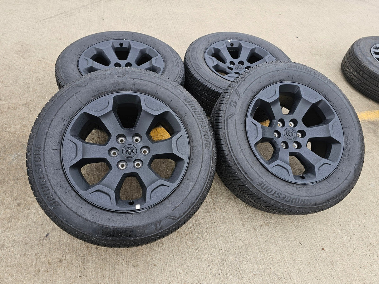 20" Dodge Ram 1500 OEM Laramie Black 2680 wheels rims 2024 2025 2026 BRIDGESTONE Texas Truck Tire