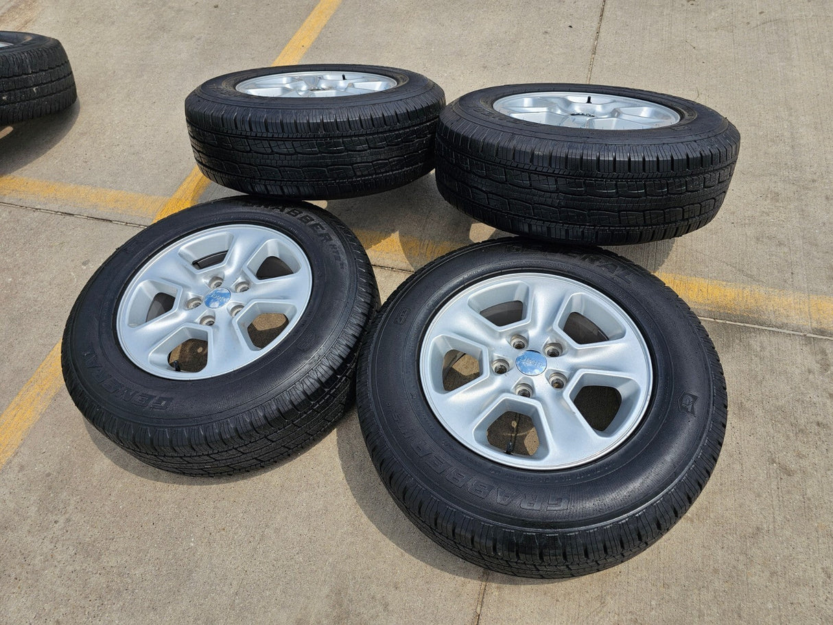 17" Jeep Grand Cherokee OEM wheels rims 9135 tires GENERAL Texas Truck Tire