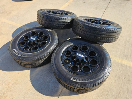 20" Ford F-250 F-350 OEM black TREMOR 10299 10484 wheels rims MICHELIN DEFENDER Texas Truck Tire